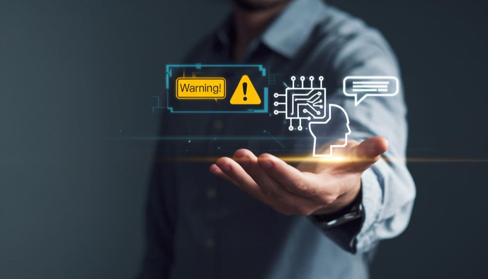 Persona mostrando íconos de advertencia y cerebro digital, simbolizando los riesgos de privacidad, sesgos y vacíos regulatorios de la inteligencia artificial.